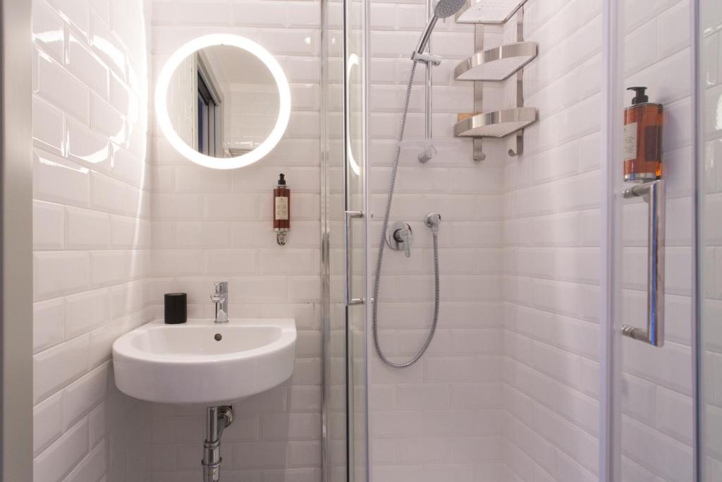 Koupelna v ubytování Intervallo Boutique Hotel