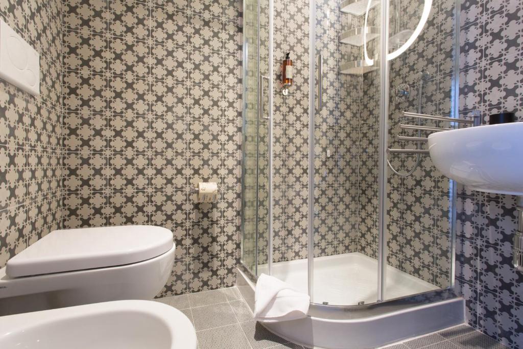 Koupelna v ubytování Intervallo Boutique Hotel