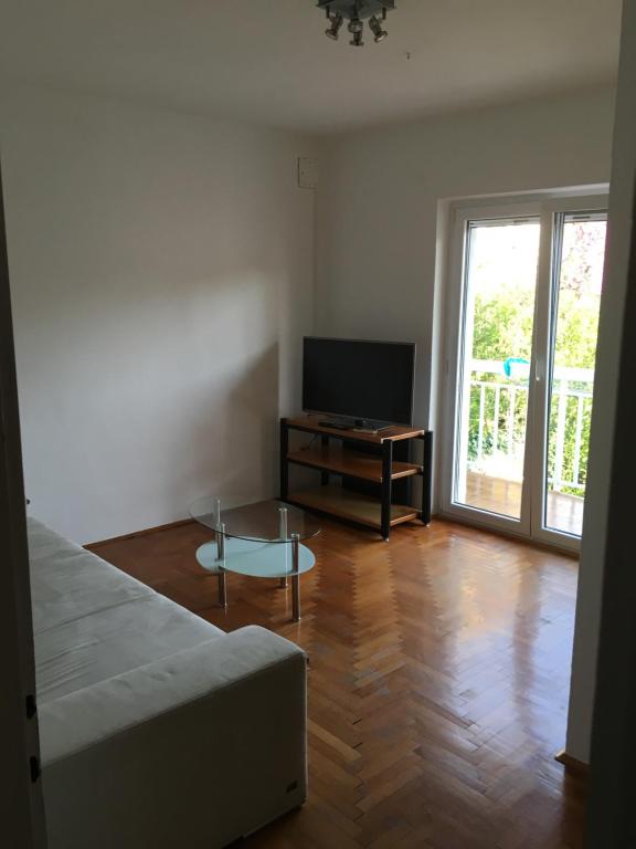 TV a/nebo společenská místnost v ubytování Apartment Velada