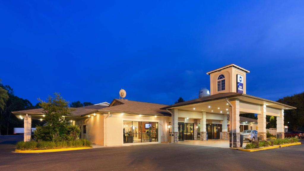 a building with a clock tower on top of it at Best Western Point South in Yemassee