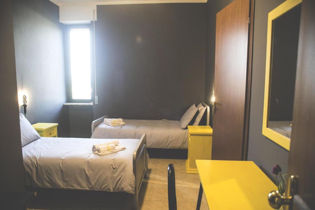 Postel nebo postele na pokoji v ubytování Lako Hostel