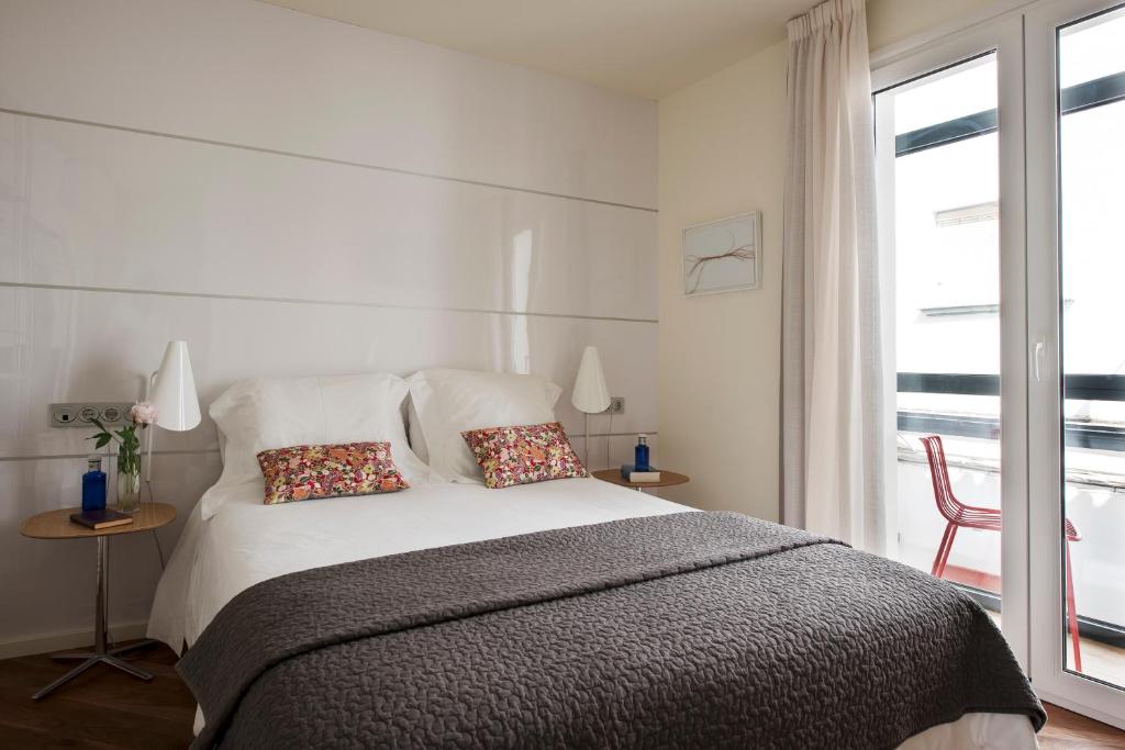 Postel nebo postele na pokoji v ubytování La Alcoba del Agua Hotel Boutique