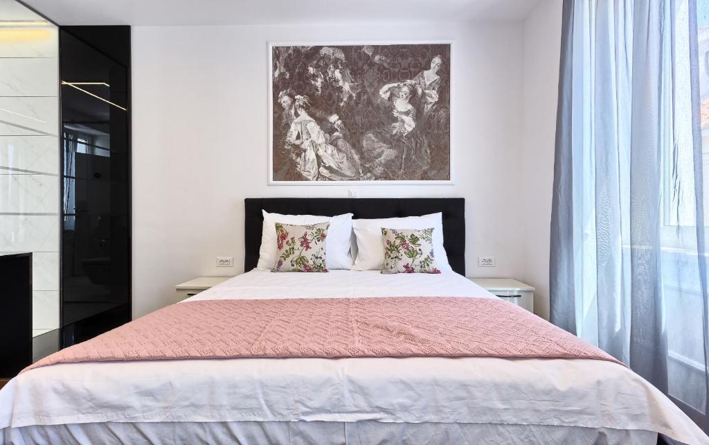 Postel nebo postele na pokoji v ubytování Mincheta - Luxury Rooms