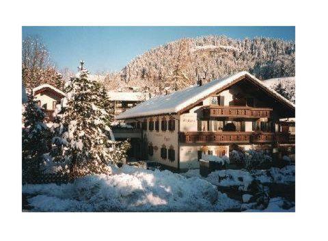 a large building with snow on top of it at Haus-Alphorn-Wohnung-15 in Oberstdorf