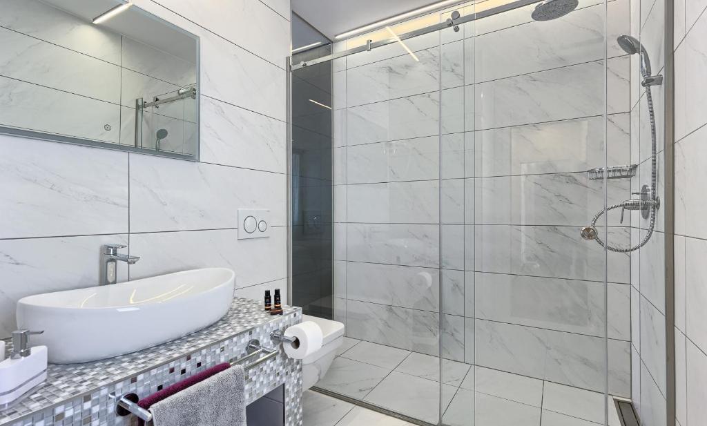 Koupelna v ubytování Mincheta - Luxury Rooms