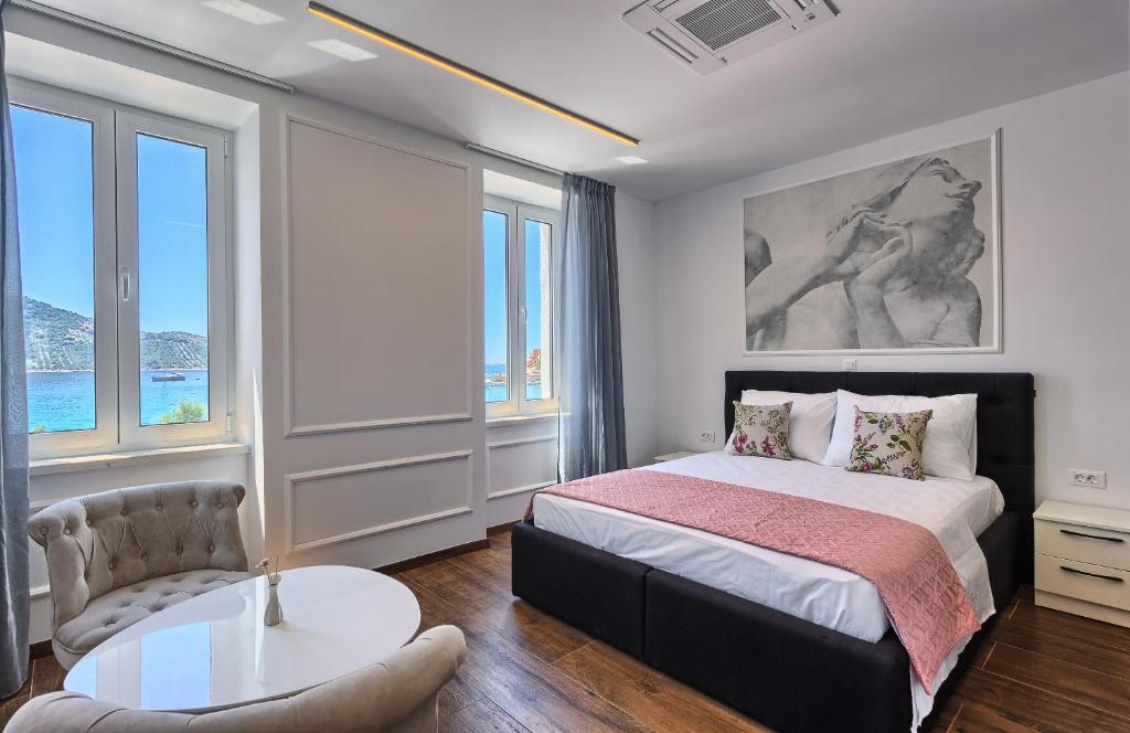 Postel nebo postele na pokoji v ubytování Mincheta - Luxury Rooms