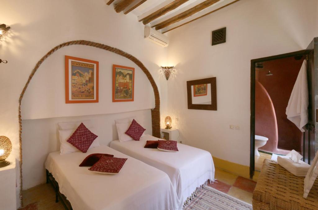 Postel nebo postele na pokoji v ubytování Riad Merstane Marrakech
