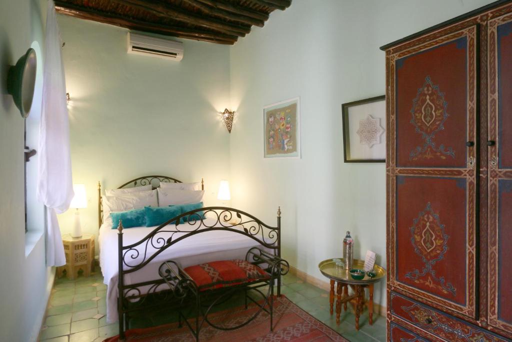 Postel nebo postele na pokoji v ubytování Riad Merstane Marrakech