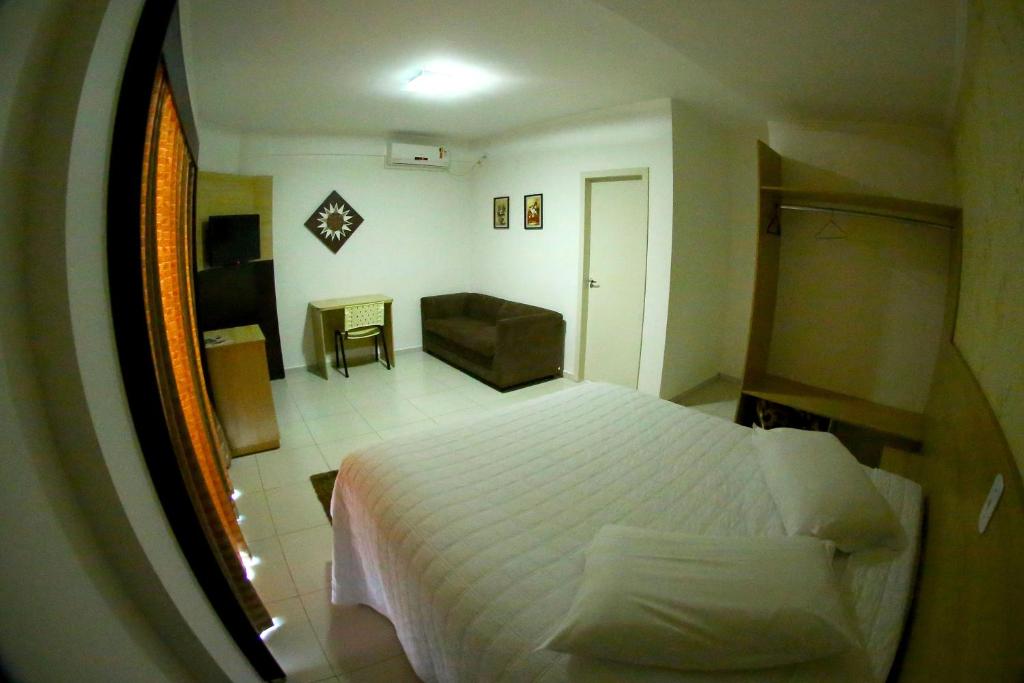 Postel nebo postele na pokoji v ubytování Morangos Hotel