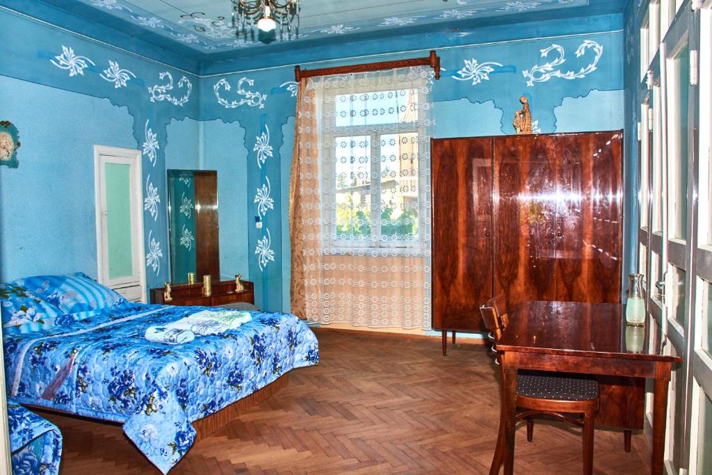 Postel nebo postele na pokoji v ubytování Nukri Guest House