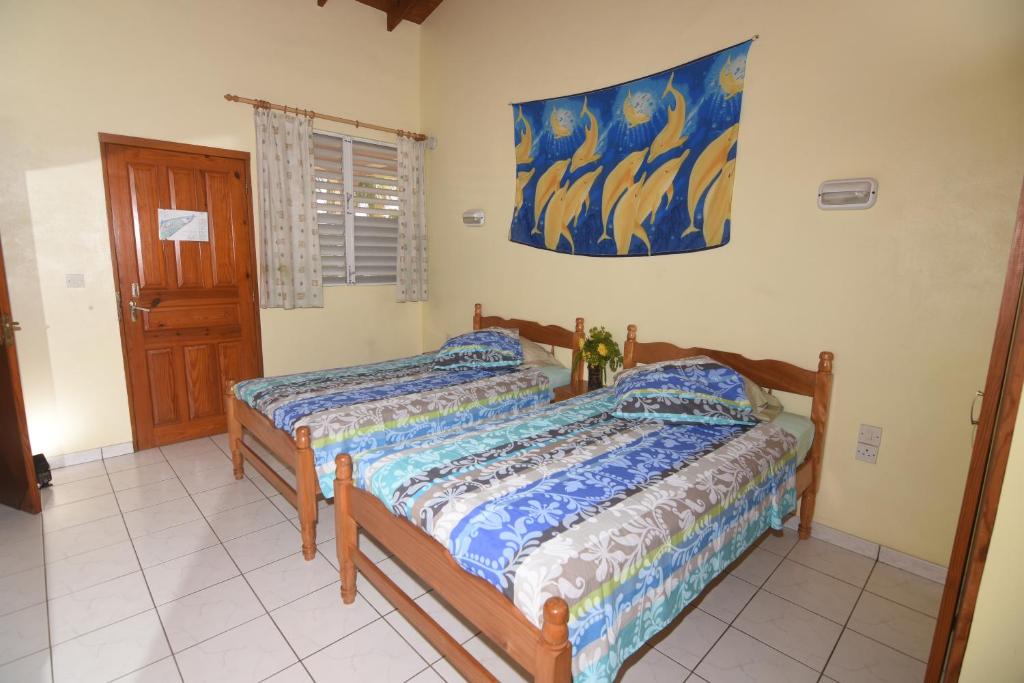 Postel nebo postele na pokoji v ubytování Sunset Bay Club All Inclusive