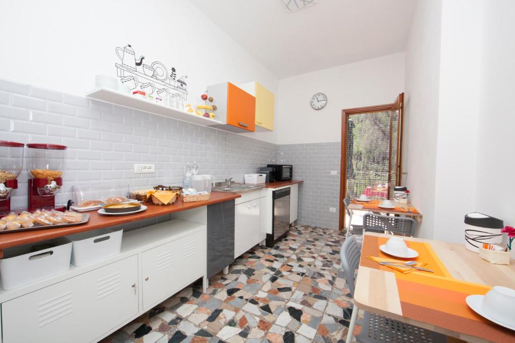 Kuchyň nebo kuchyňský kout v ubytování Lo Zizzolo- Bed&Breakfast