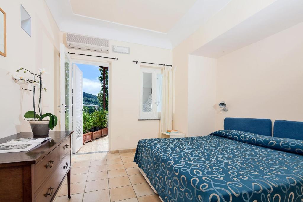 Postel nebo postele na pokoji v ubytování Hotel Senaria