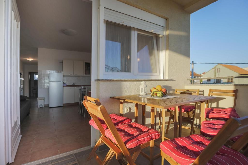Kuchyňa alebo kuchynka v ubytovaní Apartmani Maksan