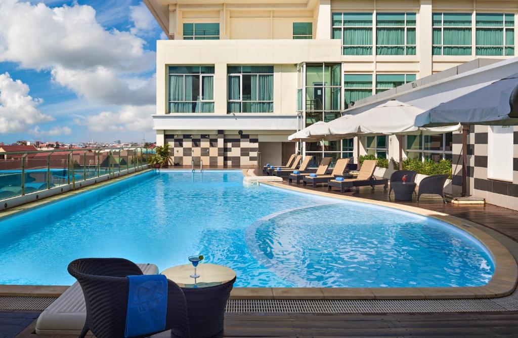 a large swimming pool on the roof of a building at Dara Airport Hotel in Phnom Penh