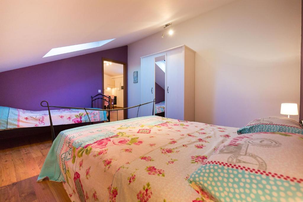 Posteľ alebo postele v izbe v ubytovaní Apartmani Maksan