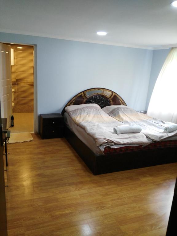 Postel nebo postele na pokoji v ubytování Guesthouse am Museum