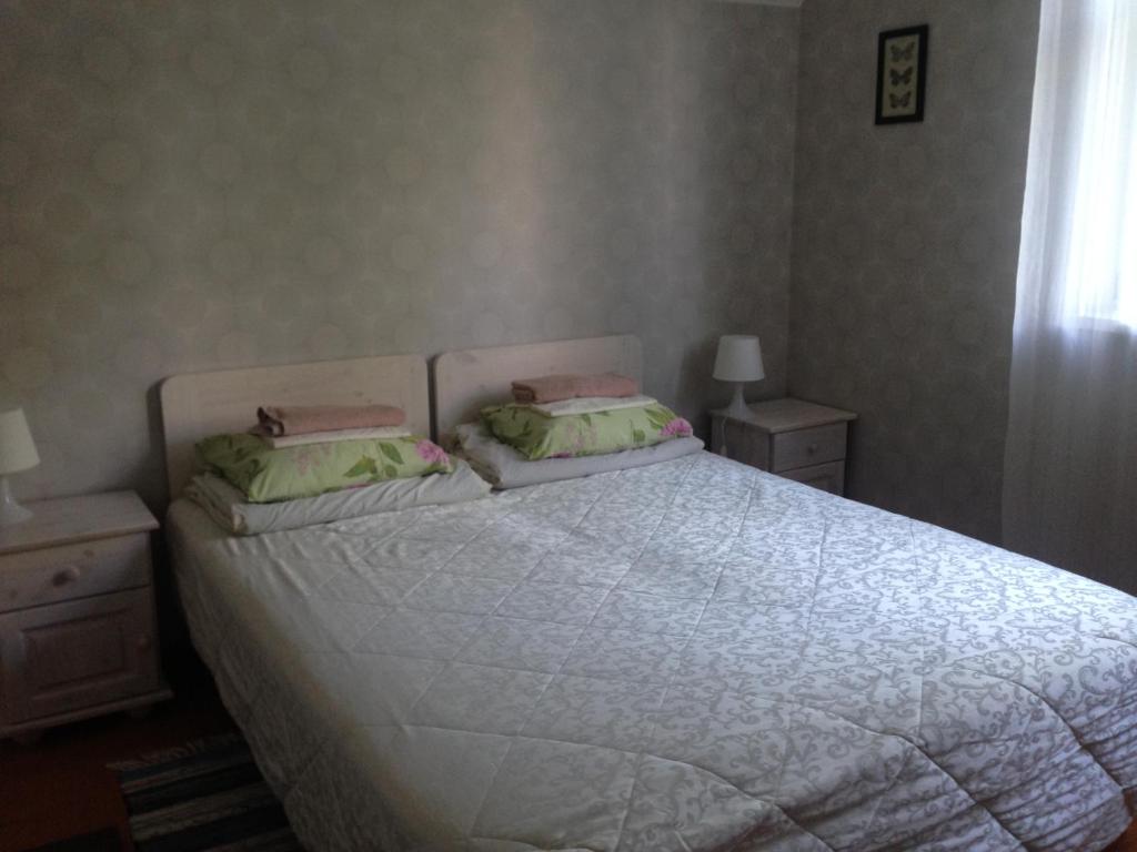 Postel nebo postele na pokoji v ubytování Sae Hostel
