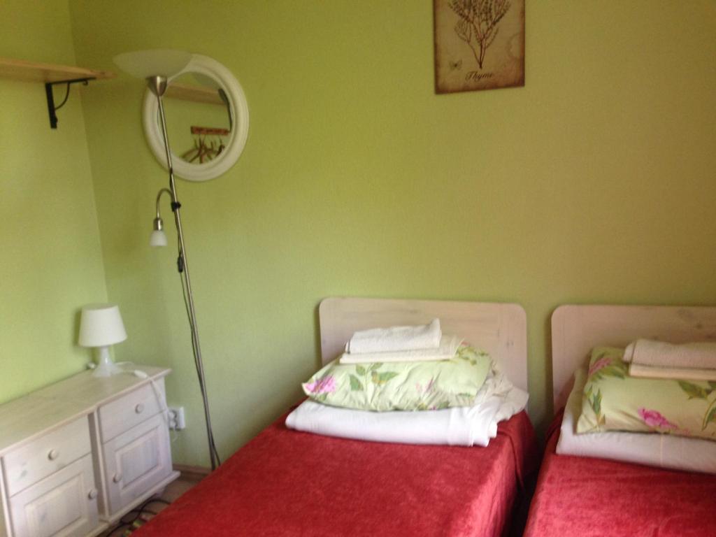 Postel nebo postele na pokoji v ubytování Sae Hostel