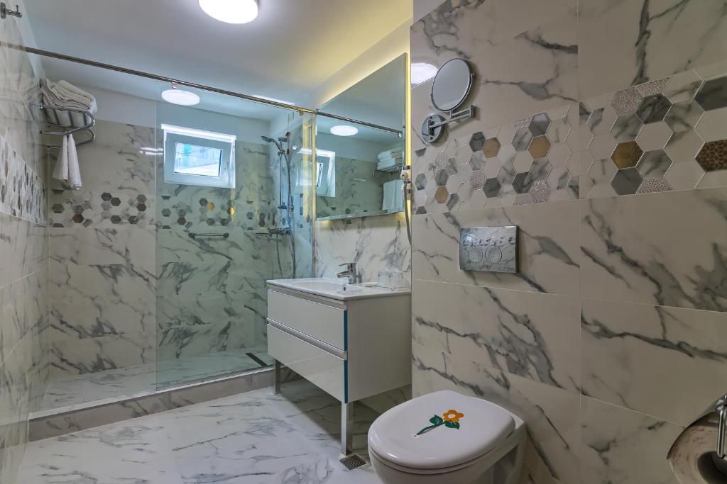 Koupelna v ubytování Hotel Saturn