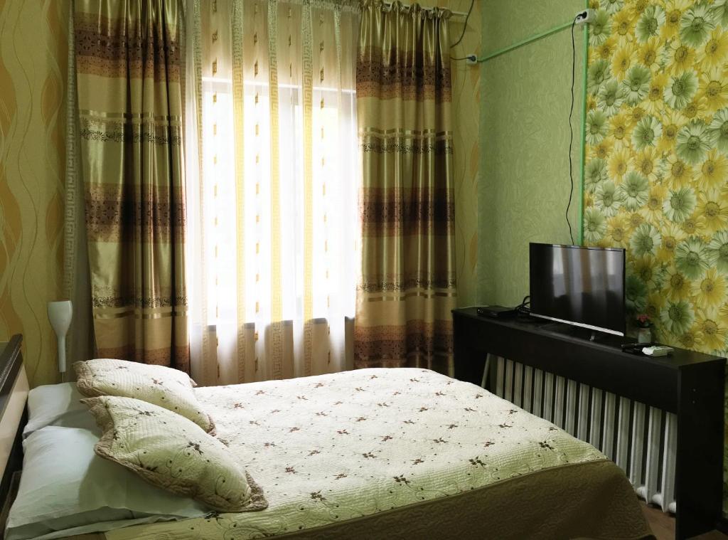 Кровать или кровати в номере iHostel Almaty