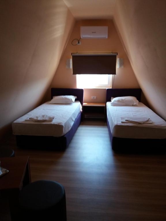 Postel nebo postele na pokoji v ubytování Casa Dalena