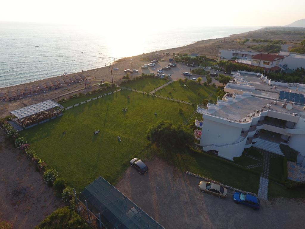 an aerial view of a park next to the ocean at Ostria Hotel Kakovatos Beach in Zakharo