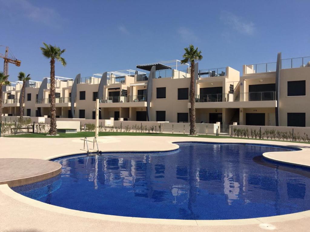 Bazén v ubytování Playa Elisa Bay nebo v jeho okolí
