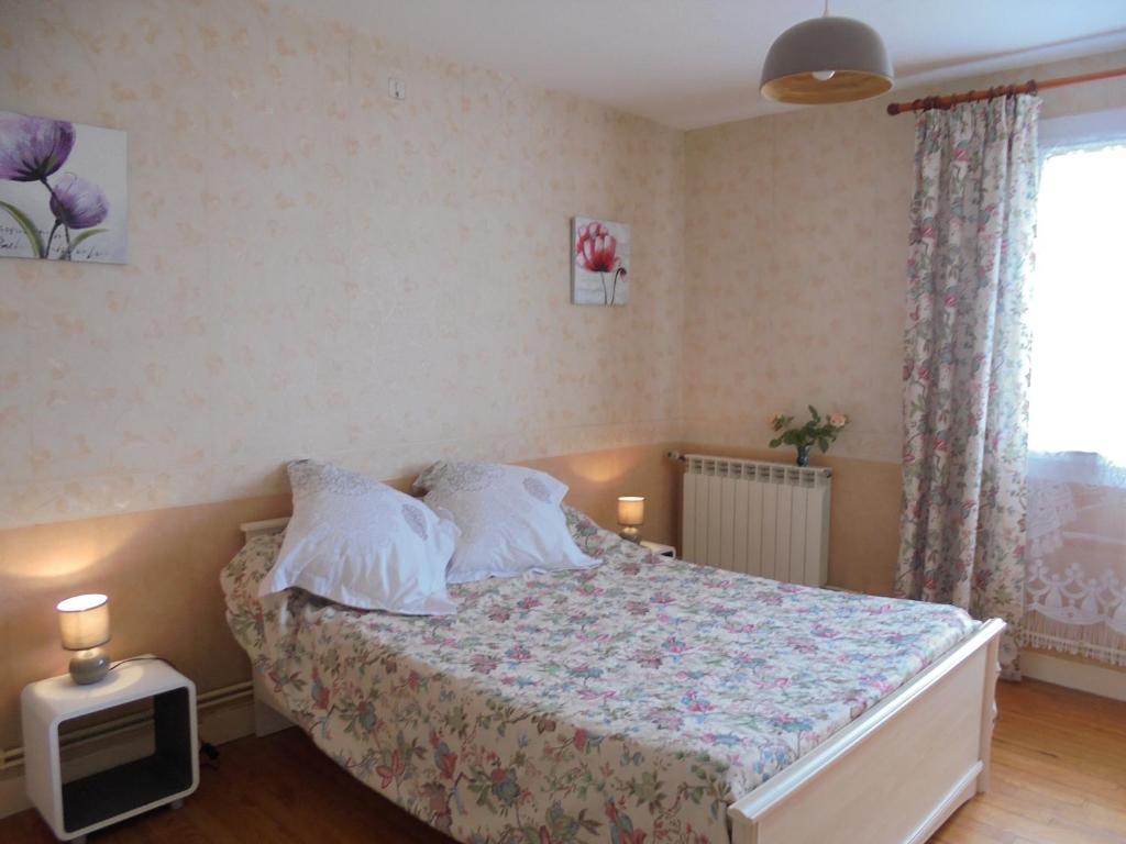 Postel nebo postele na pokoji v ubytování Chez Aline