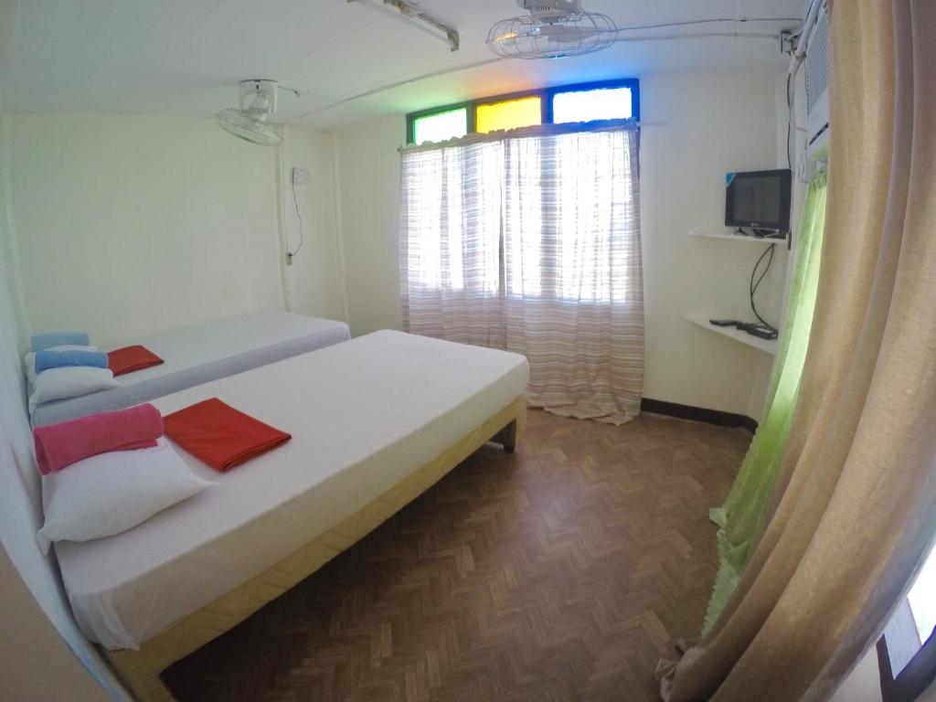 Postel nebo postele na pokoji v ubytování The BIGGIES Inn