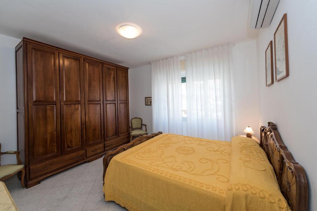 Posteľ alebo postele v izbe v ubytovaní Domitilla House