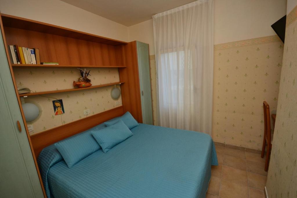 Postel nebo postele na pokoji v ubytování Hotel San Francisco Spiaggia
