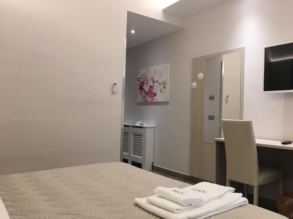 Postel nebo postele na pokoji v ubytování Alludo Aparthotel b&b
