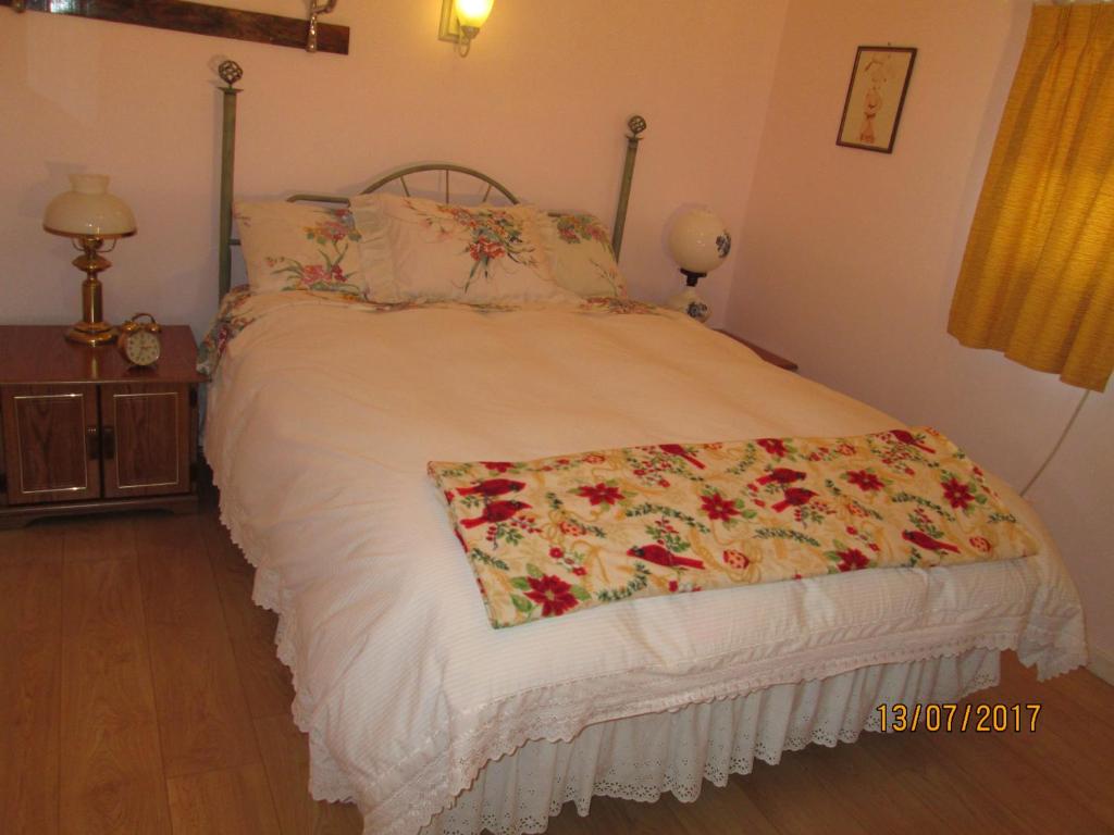 Postel nebo postele na pokoji v ubytování Tel-A-Friend Motel