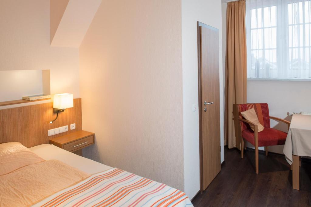 Postel nebo postele na pokoji v ubytování Appartementhaus Alte Post