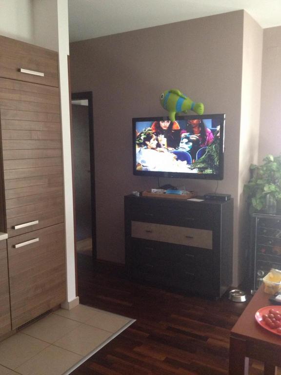 Televízia a/alebo spoločenská miestnosť v ubytovaní Zamardiresort