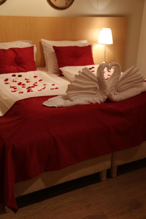 Letto o letti in una camera di Hotel Kjarnalundur- Aurora Dream - Lodges and Rooms