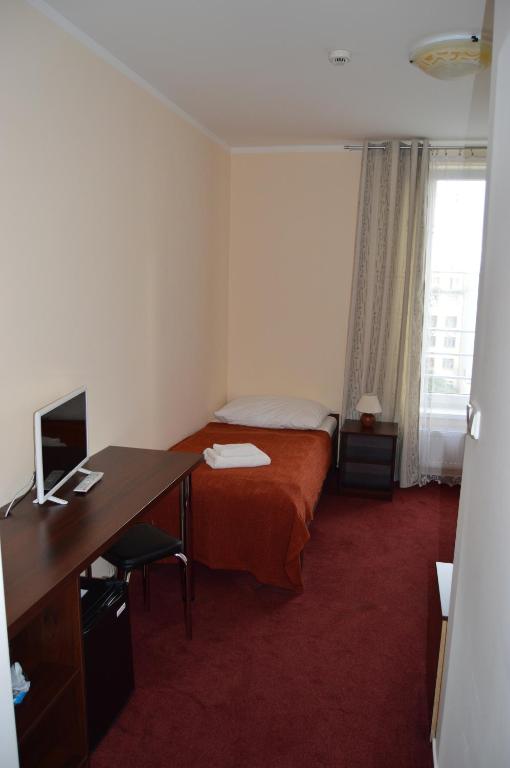TV a/nebo společenská místnost v ubytování HOTEL ARÉNA