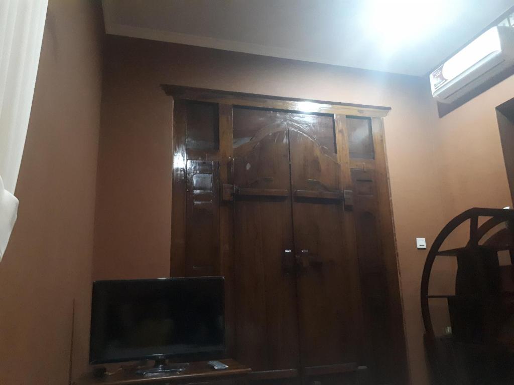 TV a/nebo společenská místnost v ubytování Indy House