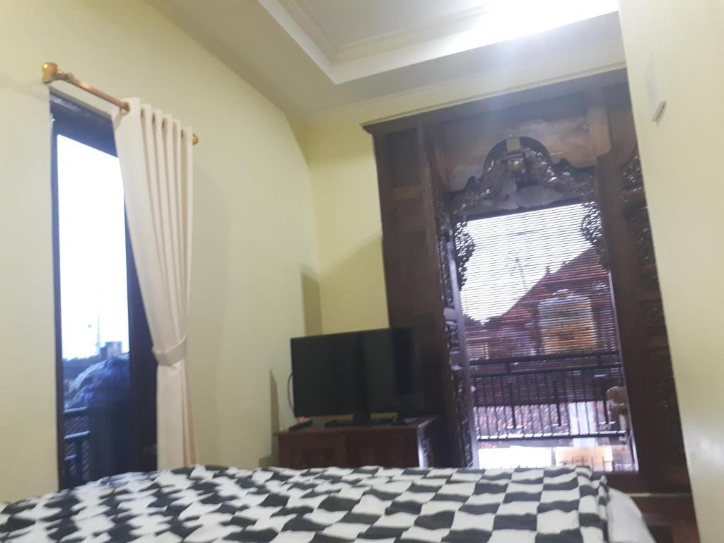 TV a/nebo společenská místnost v ubytování Indy House