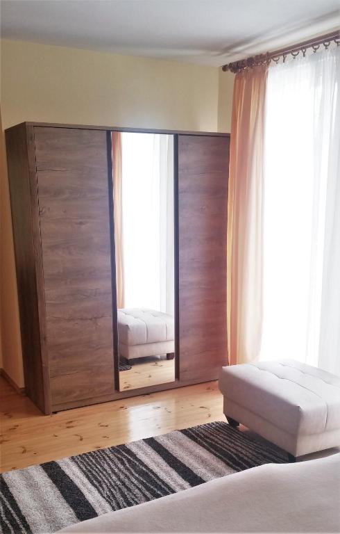 Posteľ alebo postele v izbe v ubytovaní Apartament Mikołajki