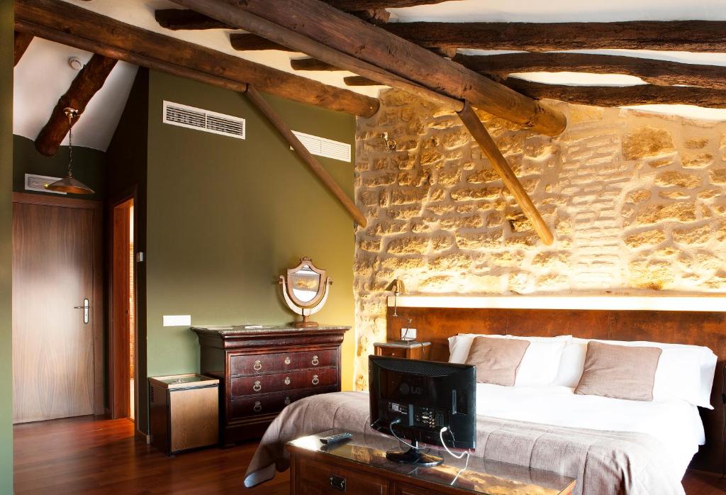 Postel nebo postele na pokoji v ubytování Hotel del Sitjar