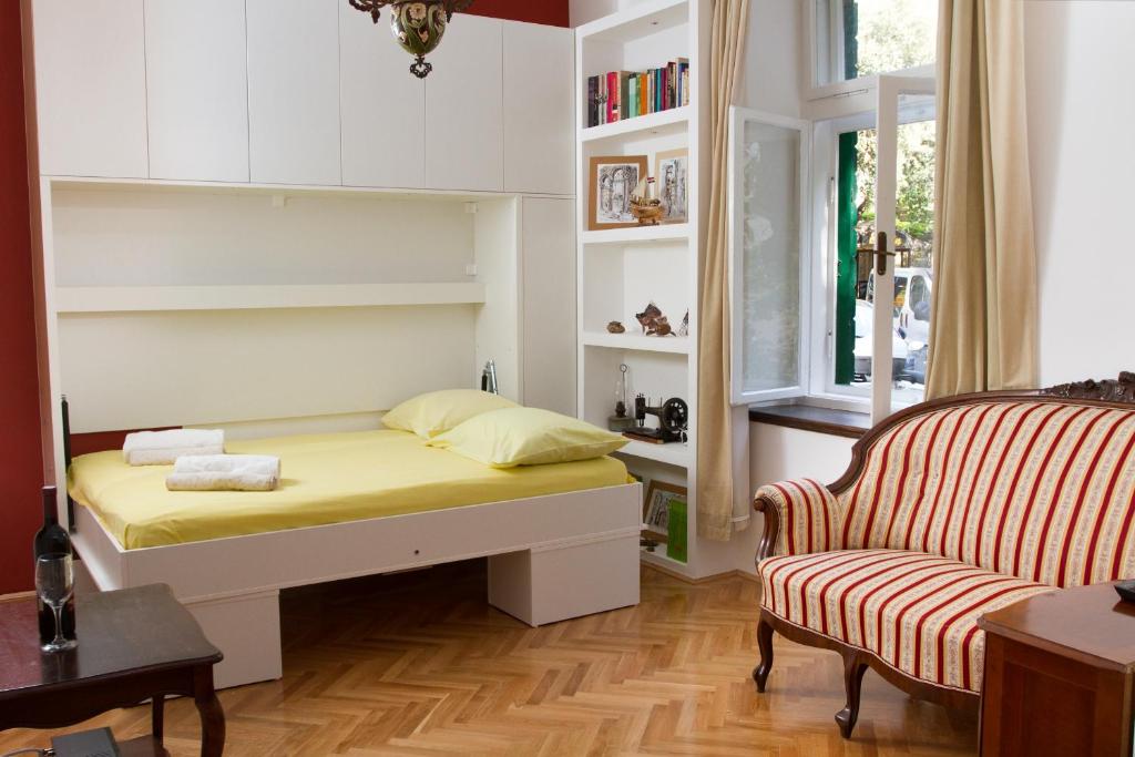 Кровать или кровати в номере Apartment Ina