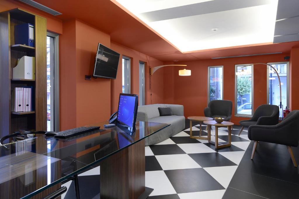 A television and/or entertainment centre at Lake Spirit Boutique Hotel & Spa