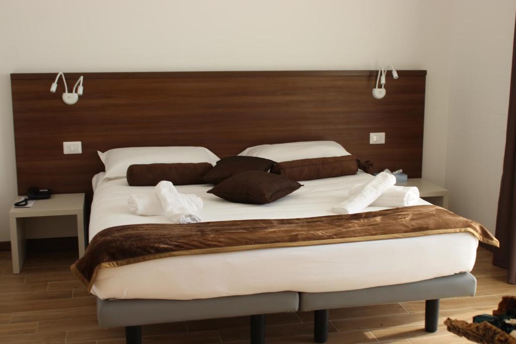 Postel nebo postele na pokoji v ubytování Hotel Bocciolo