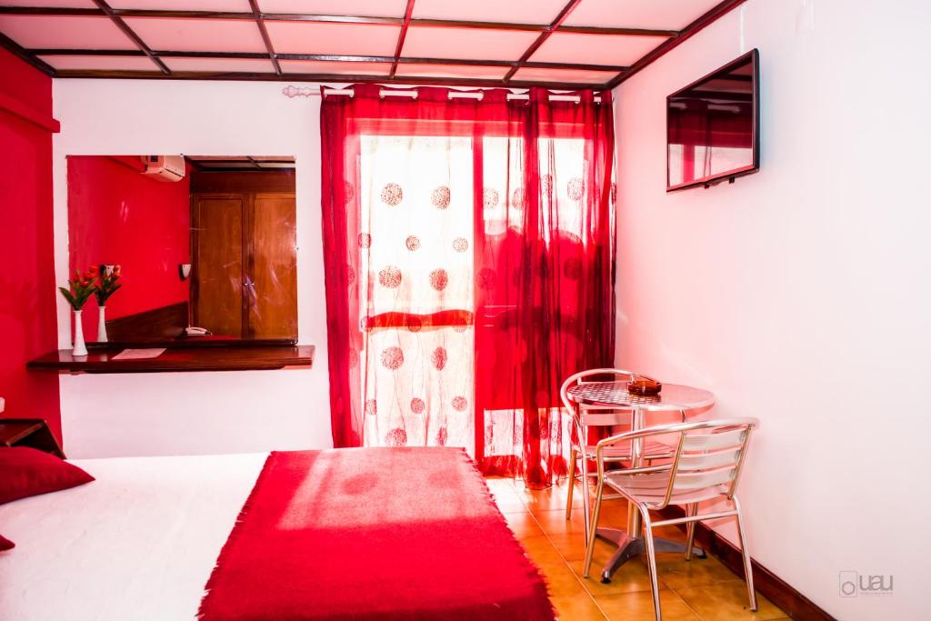 Postel nebo postele na pokoji v ubytování Aparthotel Avenida