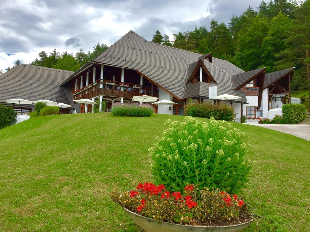 Vonkajšia záhrada v ubytovaní Hotelresort Klopeinersee
