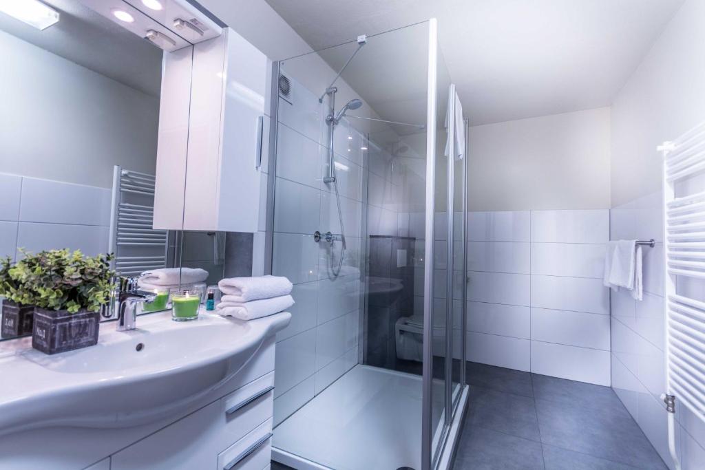 Koupelna v ubytování Hotel Riche