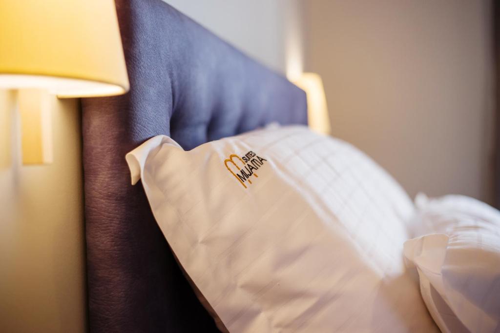 Postel nebo postele na pokoji v ubytování Mijama suites