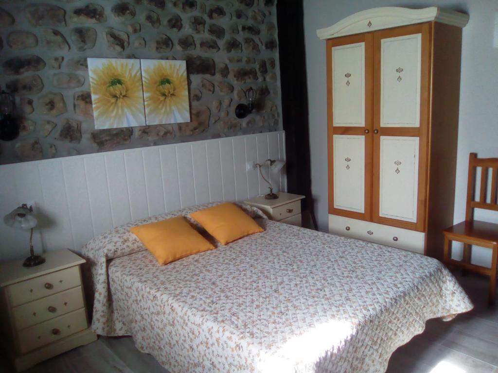 Postel nebo postele na pokoji v ubytování La Posada de Maria